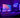 Setup PC gaming avec boîtier et éclairage RGB violet/bleu, écran et clavier — ambiance bureau gaming