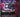 Intérieur d'un boîtier PC gaming avec carte GeForce RTX visible et éclairage RGB coloré